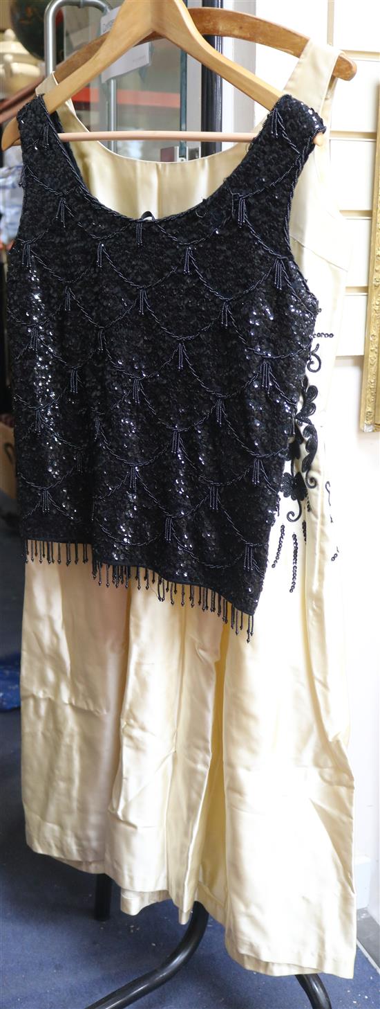 A cream silk and black sequined cocktail dress, and a black beaded and sequined top